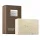 Molton Brown Black Pepper Bodyscrub Soap Bar, 250g, featuring a speckled texture, is displayed in front of its brown patterned packaging labeled "Re-charge Black Pepper.