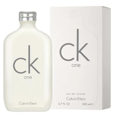 A 100 ml bottle of Calvin Klein CK One eau de toilette is placed next to its white packaging box, showcasing the same minimalist design and branding.