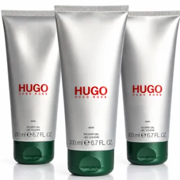 Three upright tubes of 3x Hugo Man, Hugo Boss Man Shower Gel (200 ml / 6.7 fl oz each) with silver bodies and green caps are displayed against a white background.