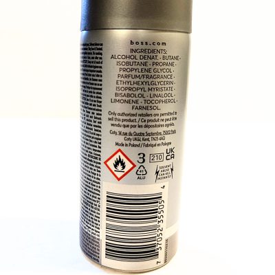 A can of Hugo Boss Bottled Deodorant Body Spray for Men on a white background.