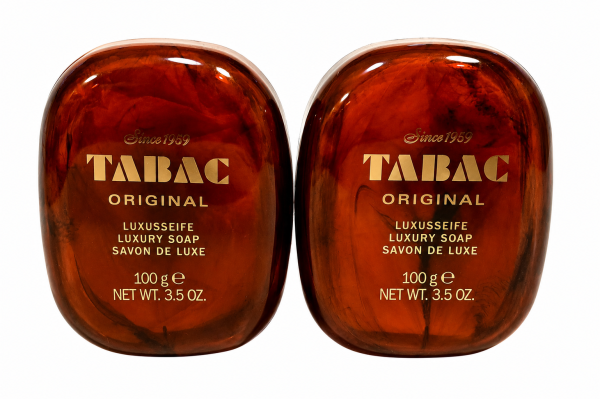 Two brown oval bars of Mäurer & Wirtz Tabac Luxury Soap, each 100 grams, presented in a box and featuring gold text and branding on the front.