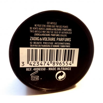 A black container with a barcode label on Issey Miyake L'eau D'issey, 200ml Pour Homme Shower Gel.