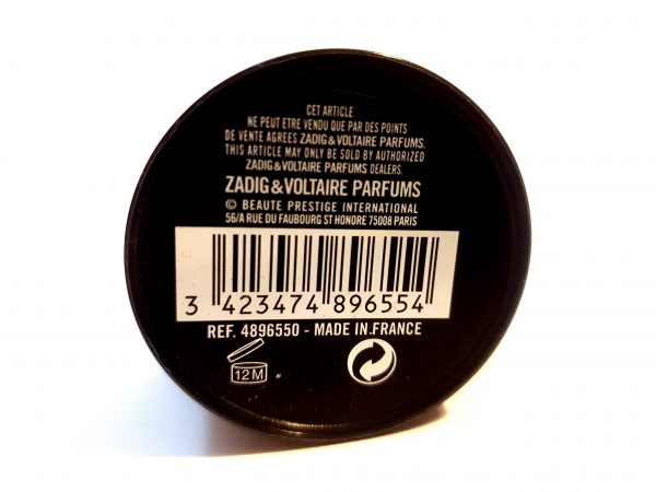 A black container with a barcode label on Issey Miyake L'eau D'issey, 200ml Pour Homme Shower Gel.