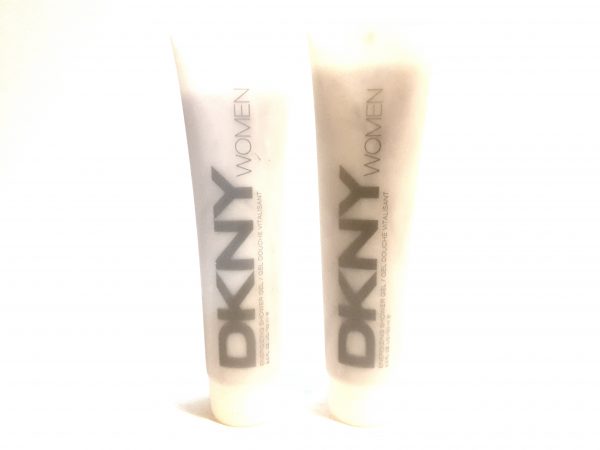 Two tubes of Issey Miyake L'eau D'issey, 200ml Pour Homme Shower Gel on a white surface.
