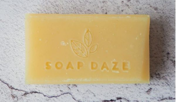 A bar of Cedarwood & Grapefruit Handmade Vegan Soap with the words soap daze on it.