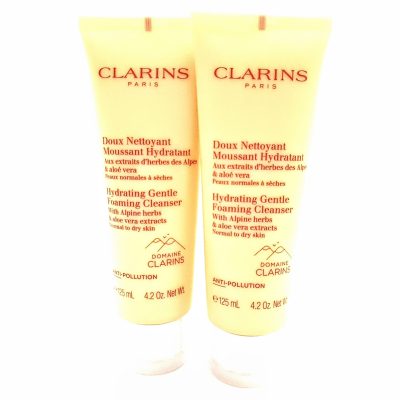 Two 125ml tubes of Clarins Hydrating Gentle Foaming Cleanser for normal to dry skin with Alpine herbs, aloe vera, and anti-pollution benefits.