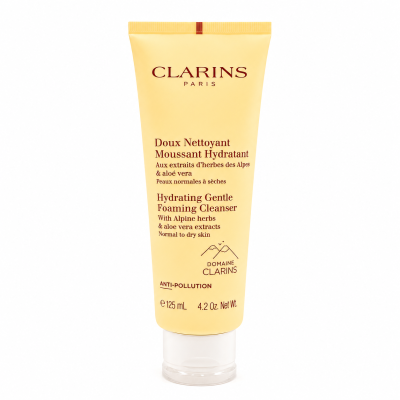 A 125 ml yellow tube of Clarins Hydrating Gentle Foaming Cleanser featuring text with ingredient details and information indicating it is suitable for normal to dry skin.