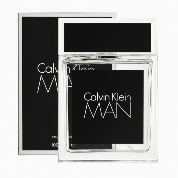 A clear glass bottle of Calvin Klein Man Eau De Toilette Spray for Men, 100ml, is displayed in front of its coordinating black-and-white box, both featuring bold white text. A clear glass bottle of Calvin Klein Man Eau De Toilette Spray for Men, 100ml, is displayed in front of its coordinating black-and-white box, both featuring bold white text.