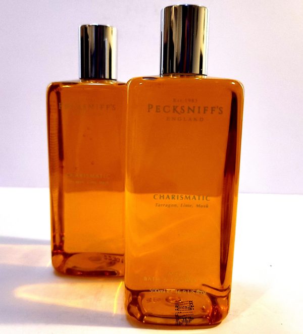 Two bottles of Pecksniffs Charismatic Mens Bath & Shower Gel, 500ml on a white surface.