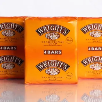 Three packages of 12x Wright's Original Coal Tar Soap 125g bars on a white surface.