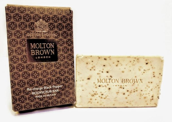 Molton Brown Black Pepper Bodyscrub Soap Bar with a box next to it.