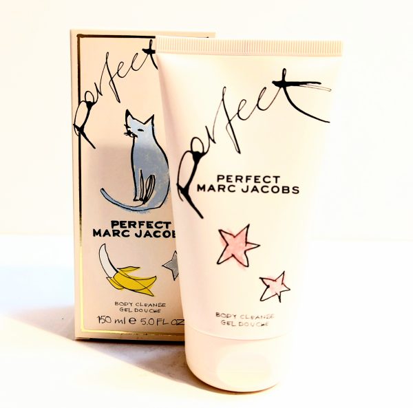 A tube of marc jacobs perfect body cleanser on a plain background.