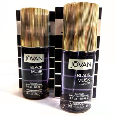 Two bottles of jovan black musk cologne in different sizes.