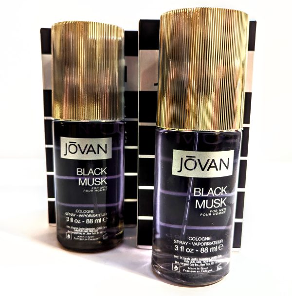 Two bottles of jovan black musk cologne in different sizes.