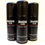 Three bottles of drakkar noir deodorant.