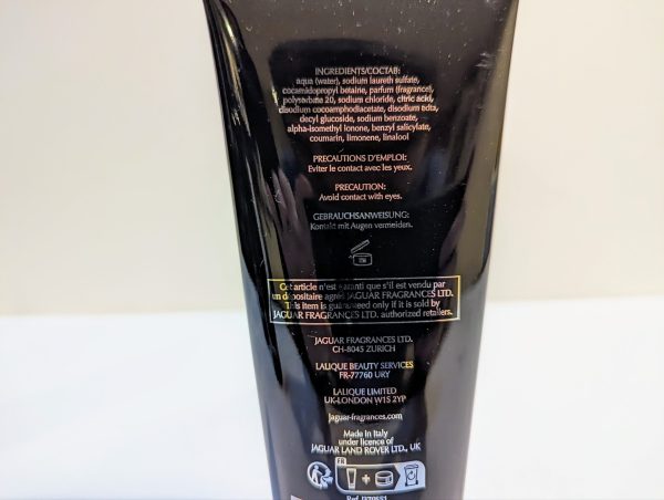 The back of a tube of black skin care product.