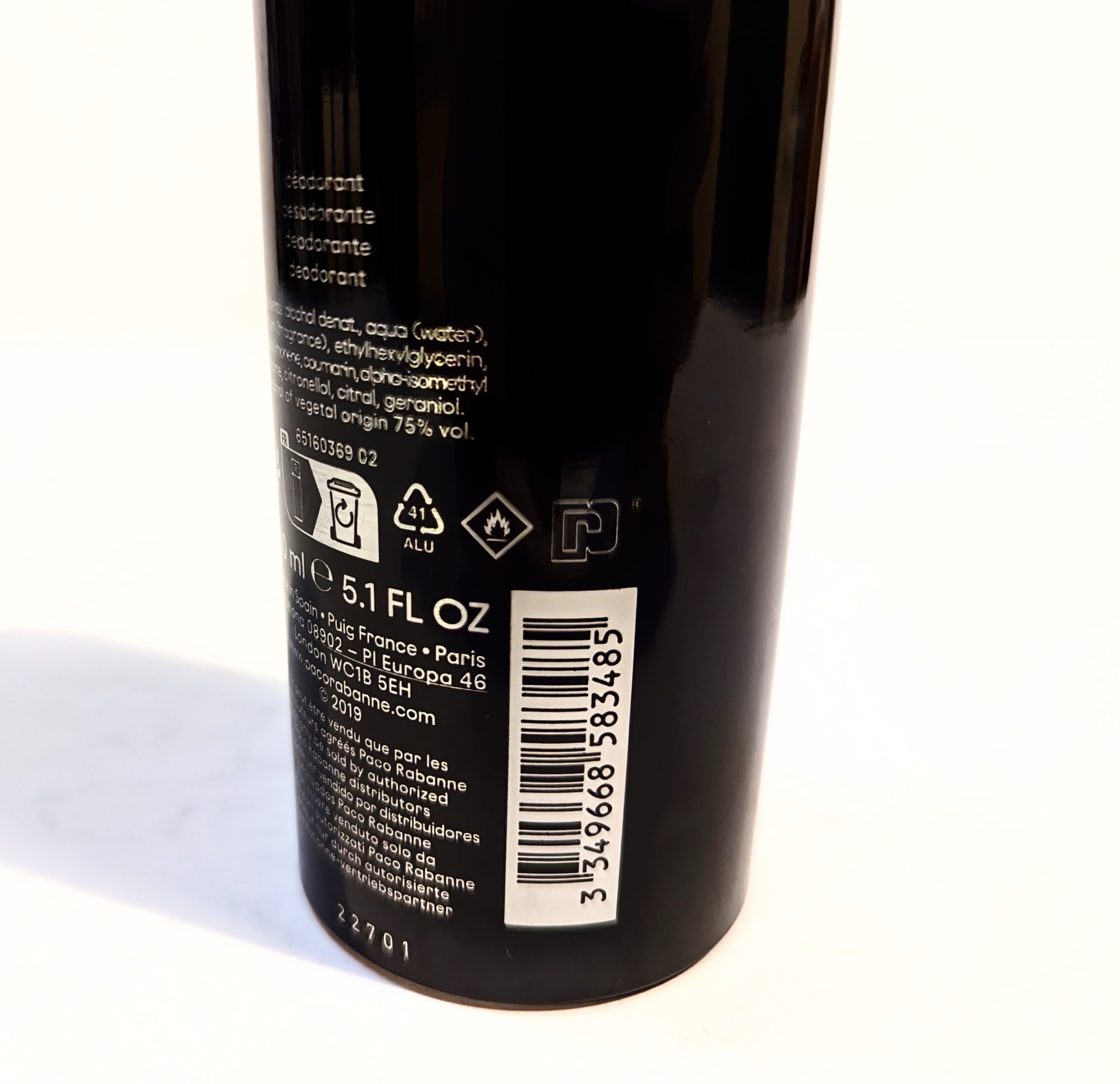 A black canister with deodorant ingredients and product information on the back, including a barcode, a capacity of 5.1 fl oz, and text in multiple languages.