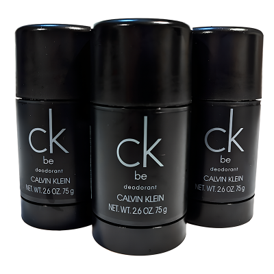 Three black Calvin Klein "ck be" deodorant sticks are arranged closely together against a white background.