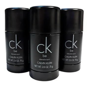 Three black Calvin Klein "ck be" deodorant sticks are arranged closely together against a white background.
