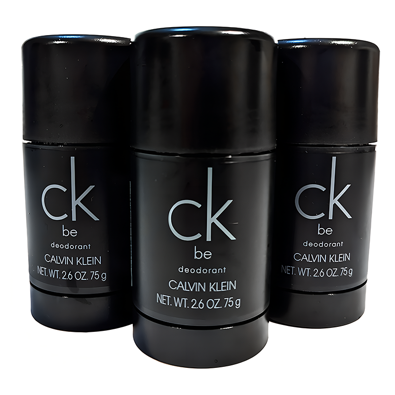 Three black Calvin Klein “ck be” deodorant sticks are arranged closely together against a white background.
