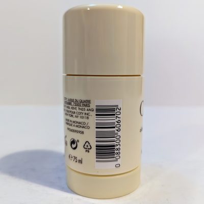 A cylindrical beige deodorant stick showing its barcode, recycling symbols, and text with usage information on the back label.