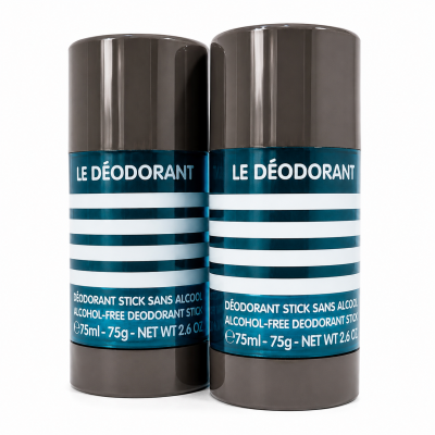 Two 75ml Jean Paul Gaultier Le Male Deodorant Sticks with blue and white striped labels that read “LE DÉODORANT,” standing side by side on a white background.