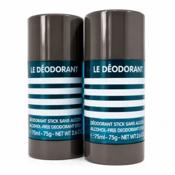 Two 75ml Jean Paul Gaultier Le Male Deodorant Sticks with blue and white striped labels that read “LE DÉODORANT,” standing side by side on a white background.