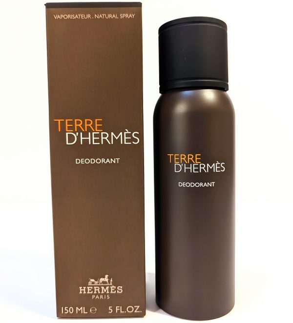 Image of Terre D'Hermes deodorant spray bottle next to its box. The bottle and box are brown with text indicating 150 ml or 5 fl.oz.