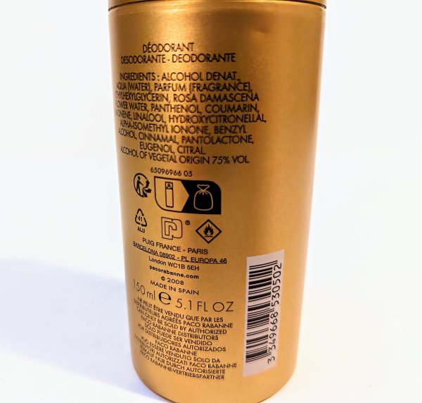 A close-up photo of a gold deodorant bottle. The label lists ingredients and details in multiple languages. The bottle contains 150 ml (5 fl oz) and is made in Spain.