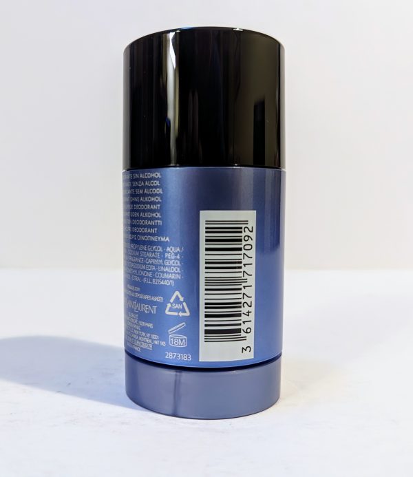 A cylindrical blue deodorant stick with a black cap is shown. The back label contains ingredients, a barcode, and a recycling symbol.