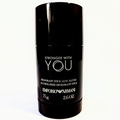 A black cylindrical deodorant stick with the text “Stronger With You” by Emporio Armani, weighs 75 grams or 2.6 ounces. The product is labeled as alcohol-free.