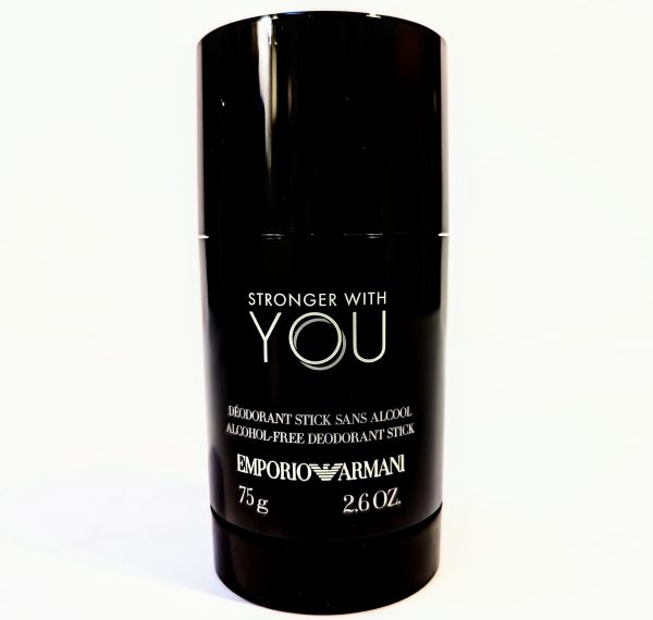 A black cylindrical deodorant stick with the text "Stronger With You" by Emporio Armani, weighs 75 grams or 2.6 ounces. The product is labeled as alcohol-free.