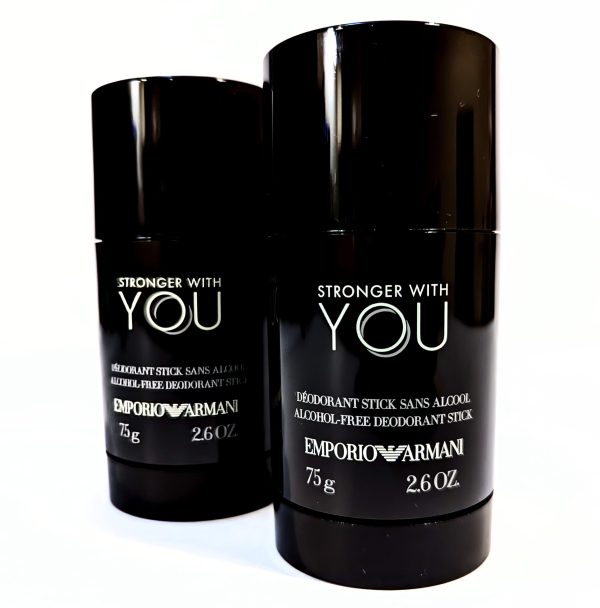 Two black deodorant sticks from Emporio Armani's "Stronger With You" line are displayed against a white background. Each stick is labeled alcohol-free and weighs 75g (2.6 oz).