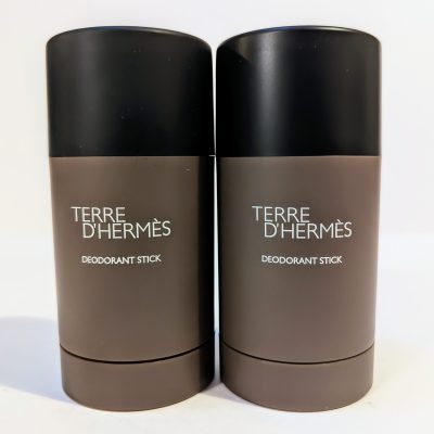 Two Terre d'Hermès deodorant sticks are placed side by side against a white background.
