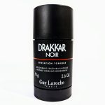 A black cylindrical container of Drakkar Noir deodorant by Guy Laroche, labeled "Sensation Tonique," with a net weight of 75g (2.6 oz).