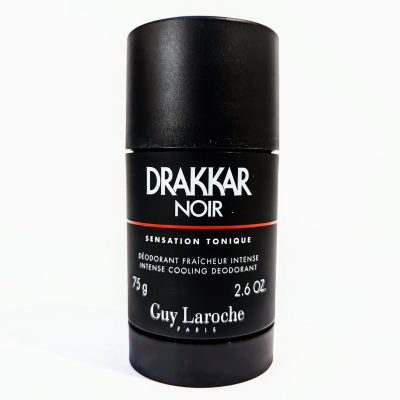 A black cylindrical container of Drakkar Noir deodorant by Guy Laroche, labeled “Sensation Tonique,” with a net weight of 75g (2.6 oz).