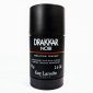 A black cylindrical container of Drakkar Noir deodorant by Guy Laroche, labeled 