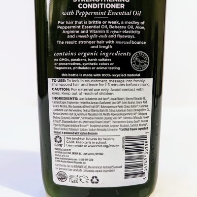 A bottle of strengthening conditioner with peppermint essential oil. The label lists ingredients, benefits, usage instructions, and cautionary information. Barcodes and certification logos are at the bottom.