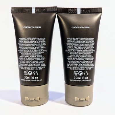 Two black cosmetic tubes labeled "London via China," containing 30ml (1 fl oz) each. Ingredients and product details are listed on the back.