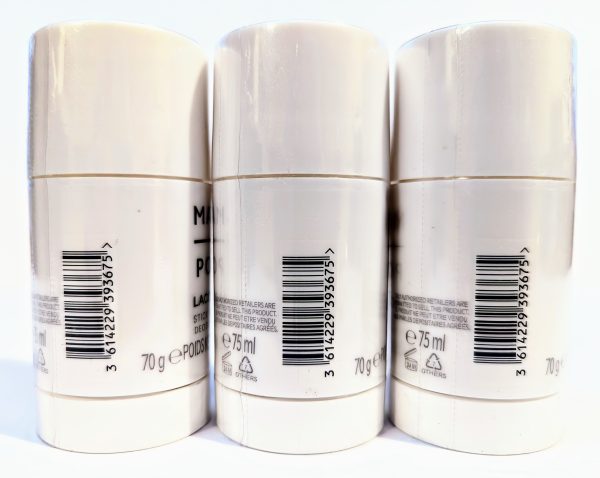 Three white cylindrical containers of a grooming product are aligned next to each other, showing different barcodes and labels. Each container holds 75 ml and has a 70 g net weight.