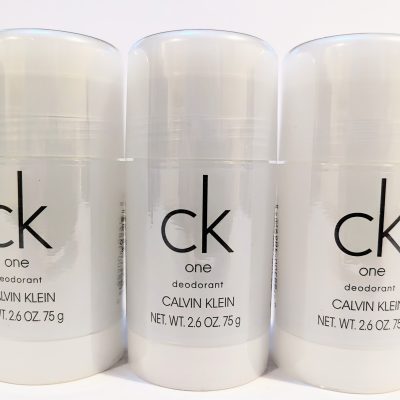 Three bottles of Calvin Klein CK One deodorant, each with a net weight of 2.6 oz (75 g), are displayed side by side against a white background.