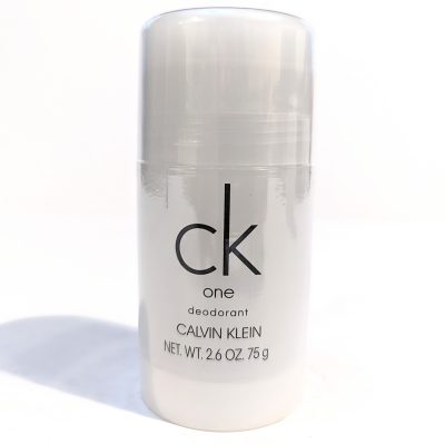 A clear plastic deodorant stick labeled "ck one Calvin Klein" with a net weight of 2.6 oz (75 g) against a white background.