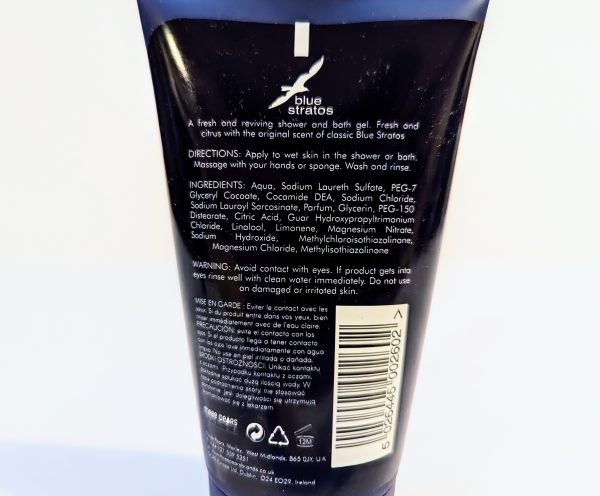 Back label of a Blue Stratos shower gel bottle showing directions for use, ingredients, and a warning. A barcode and the brand logo are also visible.