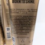 Back of a shampoo bottle showing ingredients list, including water, sodium laureth sulfate, PEG-7 glyceryl cocoate, and parfum. Labels are printed in multiple languages.