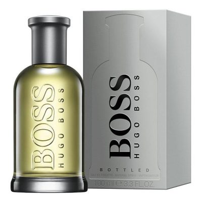 A bottle of Hugo Boss Bottled EDT for Men 100ml, Eau de Toilette sits next to its matching grey box with "BOSS Hugo Boss" printed on both.