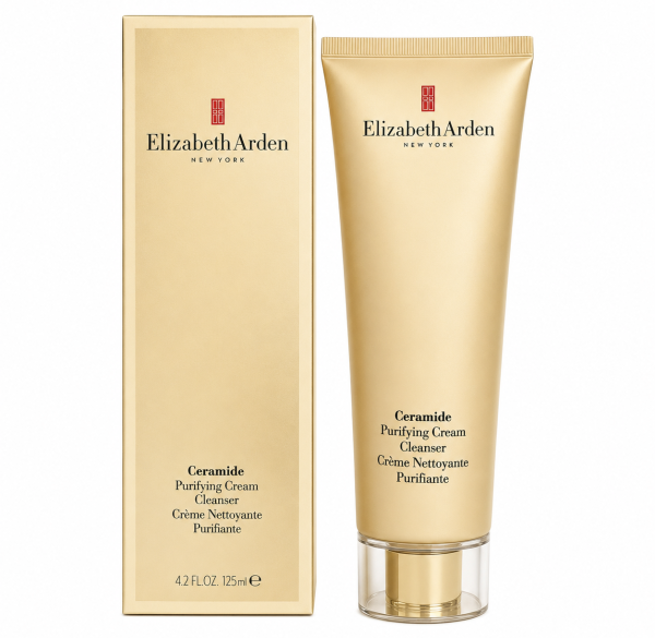 A gold tube and matching box of Elizabeth Arden Ceramide Purifying Cream Cleanser, 125ml, both standing upright on a white background, elegantly showcasing the signature style of Elizabeth Arden skincare. A gold tube and matching box of Elizabeth Arden Ceramide Purifying Cream Cleanser, 125ml, both standing upright on a white background, elegantly showcasing the signature style of Elizabeth Arden skincare.