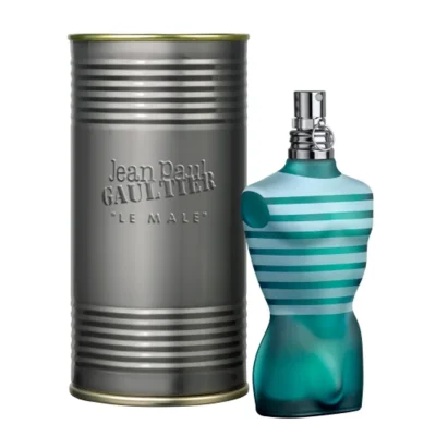 A cylindrical metal container labeled with "Jean Paul Gaultier Le Male Eau de Toilette EDT 125ml Spray" next to a torso-shaped perfume bottle featuring a blue and white striped design.