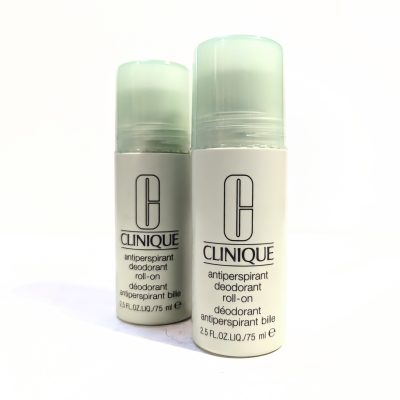 Two Clinique antiperspirant deodorant roll-on bottles with green caps. The bottles are labeled in English and French and are 75 ml or 2.5 fl. oz. each.