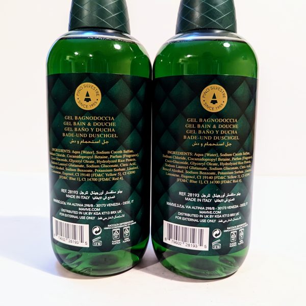 Two green bottles of Italian-made shower gel are shown with bilingual labeling in English and Italian, listing product information, ingredients, and manufacturing details.