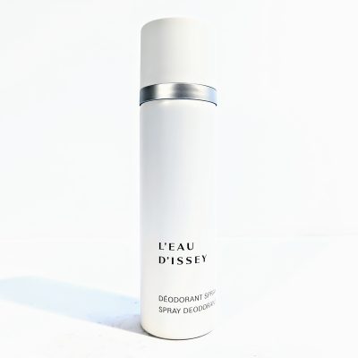 A white cylindrical bottle labeled "L'Eau d'Issey Déodorant Spray" standing upright against a plain white background.